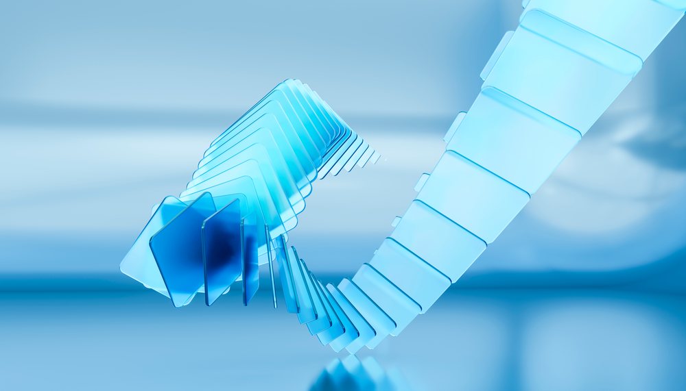 Blue transparent square panels arranged in a flowing abstract 3D composition against a light blue background.