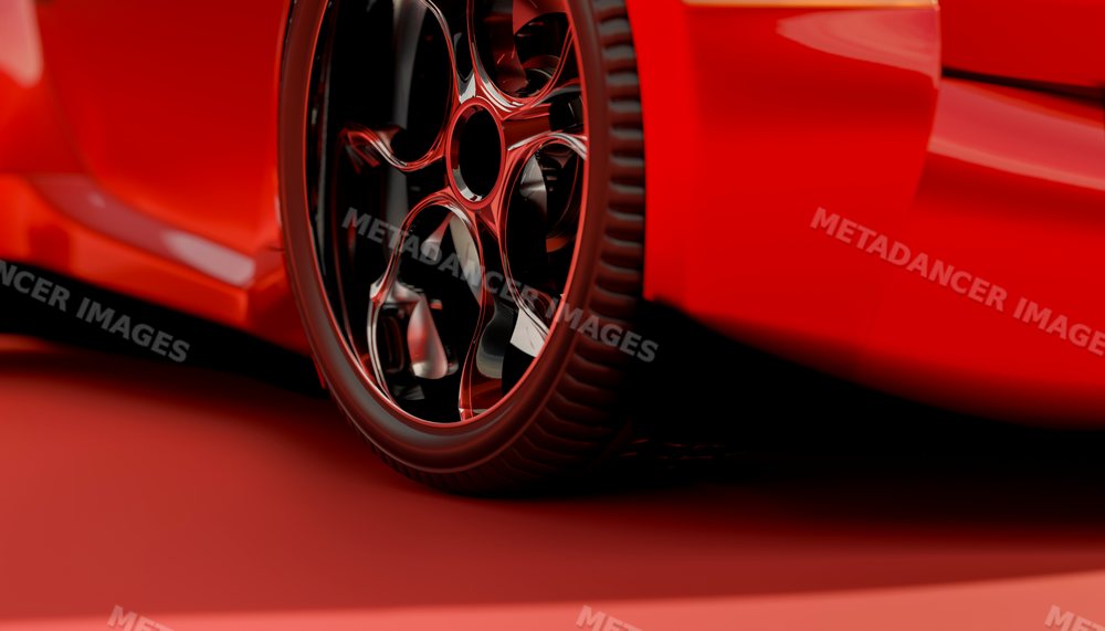 Close-up of a red vehicle wheel showcasing tire and rim detail