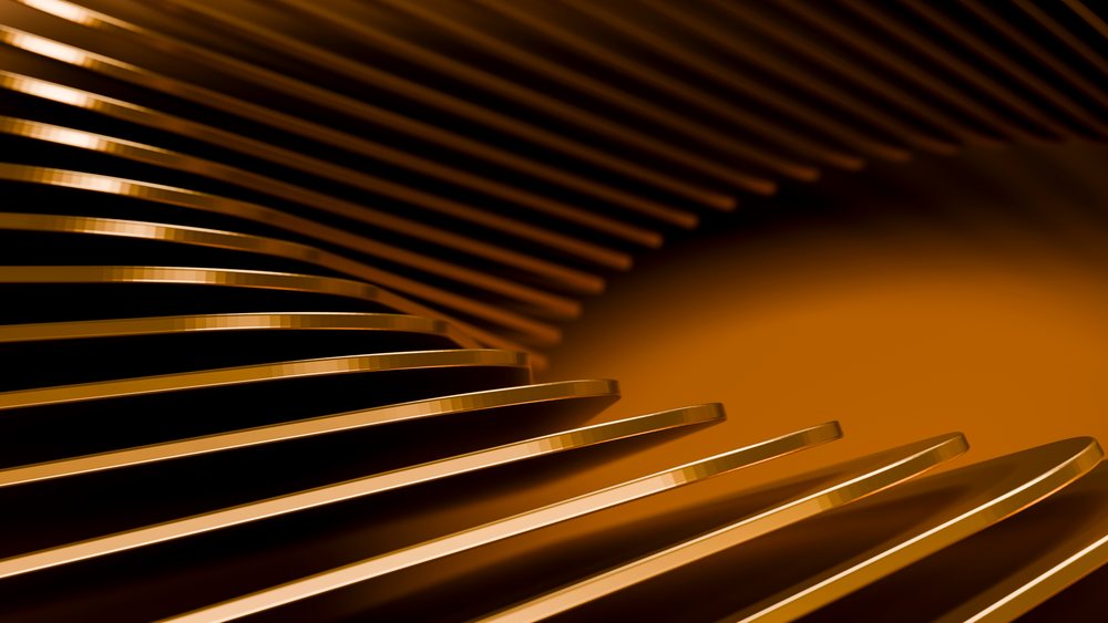 Close-up showing smooth, reflective, golden metallic curves forming an arched pattern.