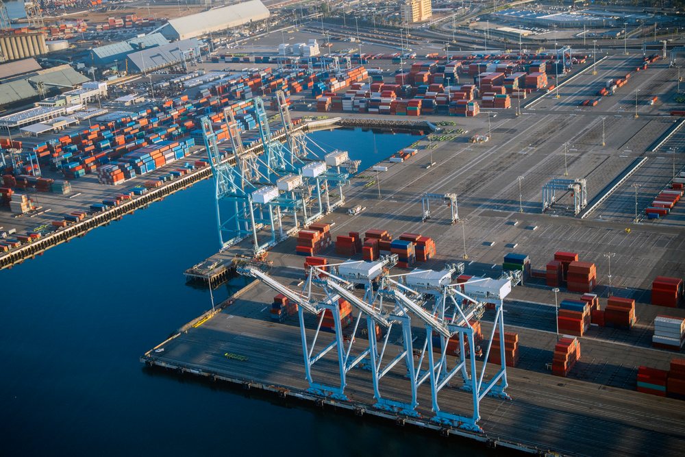 Container cranes and shipping containers at the cargo terminal in Long Beach, lifornia, major port terminal, CA, USA.