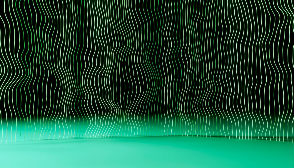 Green wavy vertical lines glow against a black background with a turquoise floor in an abstract digital art scene.
