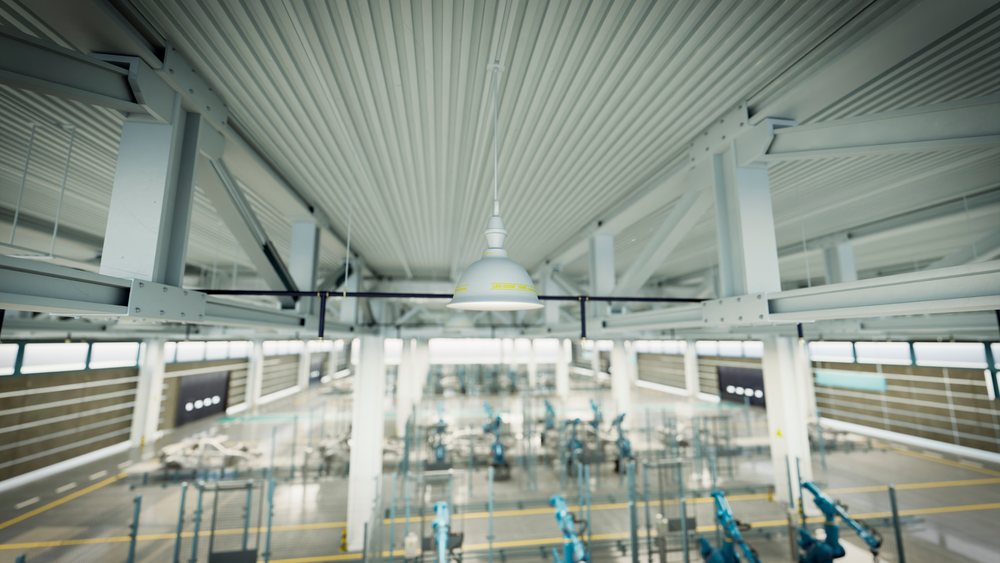 Industrial lighting fixture hanging from a metal truss ceiling in a large manufacturing plant with robotic assembly lines and robot arms, car, industry.