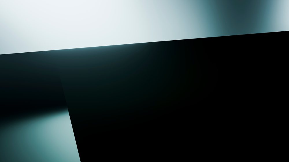 Abstract dark and light angled shapes form contrasting geometric patterns with smooth reflective surfaces.