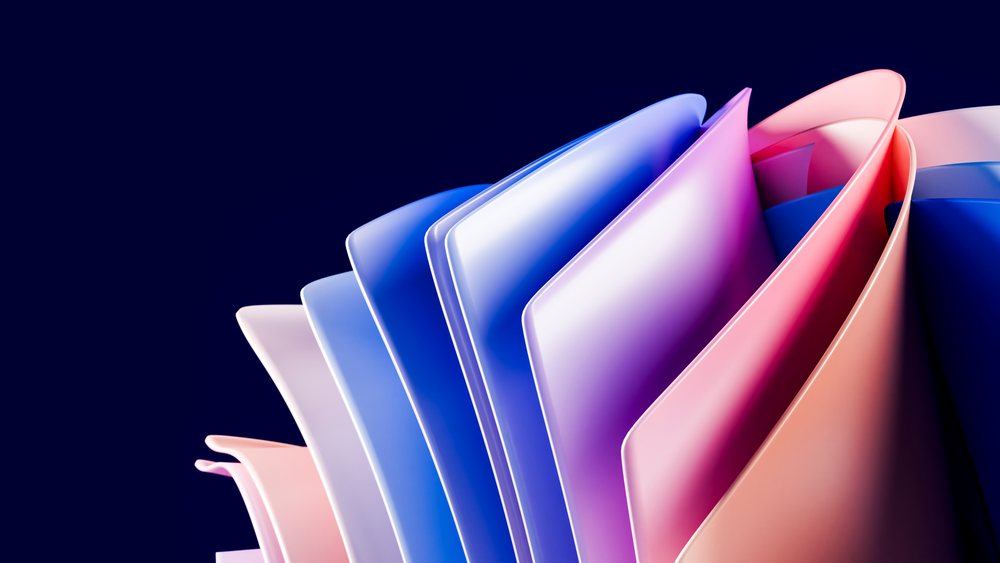 Digital illustration featuring curved, colorful shapes with smooth gradients in vibrant blue and pink hues on a dark background.