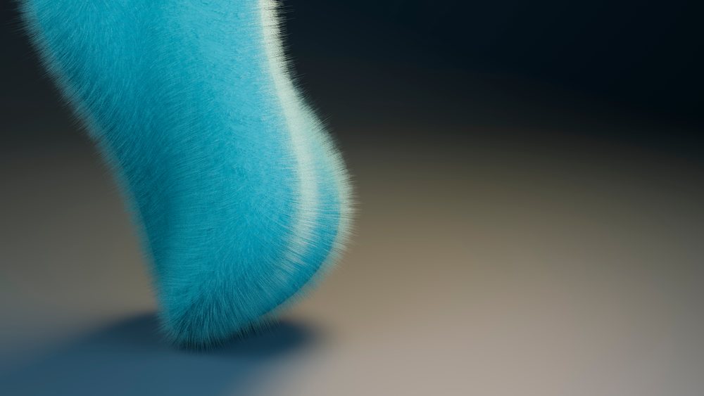 Close-up of blue fur showing fine hair fibers and soft texture against a gradient background.