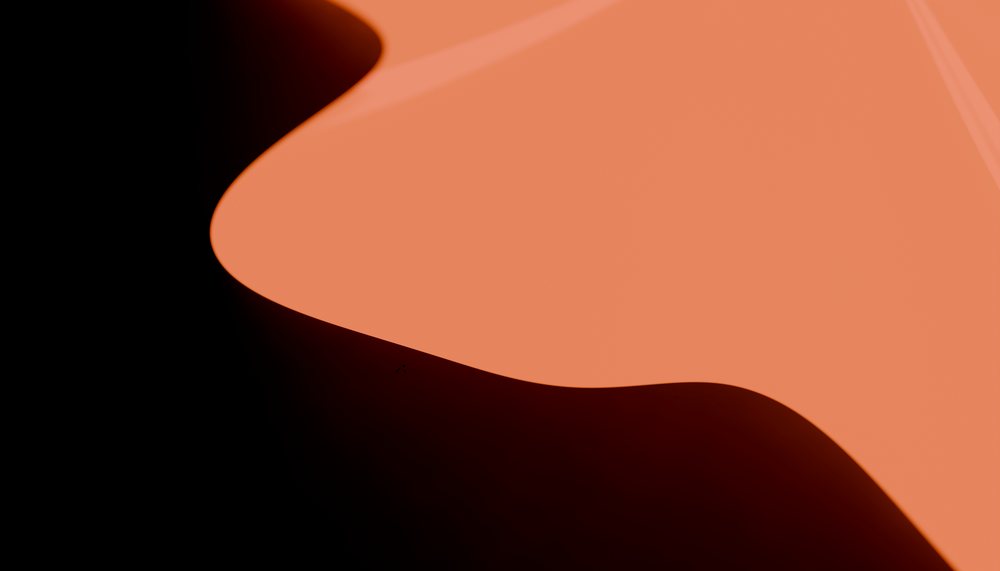 Abstract shapes featuring a flowing orange wavy form on a black background.