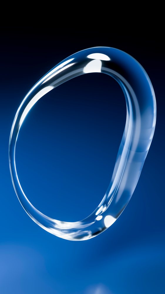 Transparent glossy ring-shaped loop with fluid curved form floats against a blue gradient background in this digital illustration.