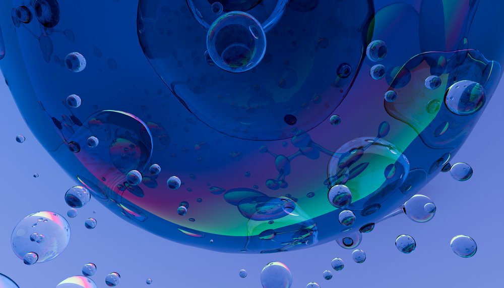 Digital illustration of transparent blue bubbles with colorful reflections floating against a light blue background.