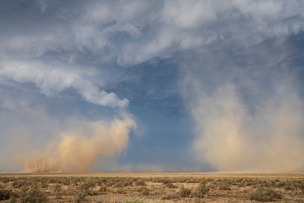 Dust storm with rotating updrafts from a Tornado-Warned Supercell over dry grassland, Storm Chasing, Weather, Environment, Fowler, Colorado, USA.