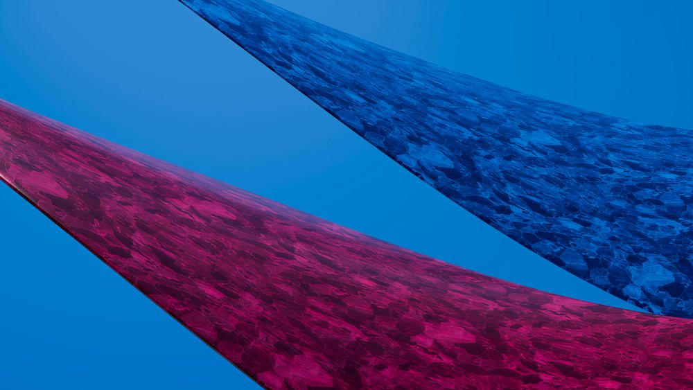 Abstract red and blue textured geometric shapes with stone-like surfaces positioned diagonally against a blue background.