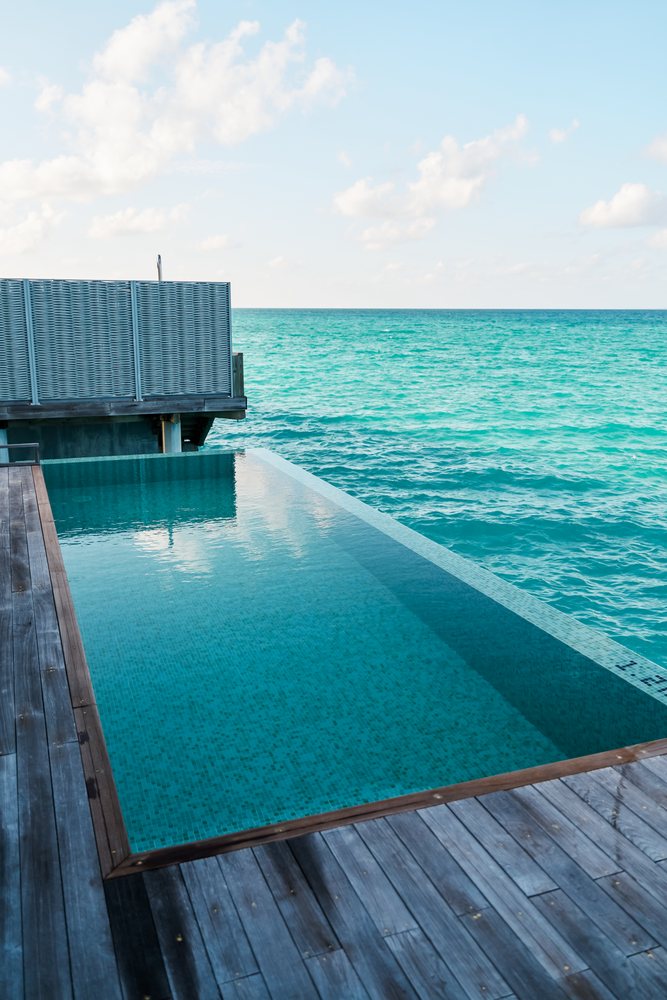 An infinity pool overlooking the turquoise ocean
