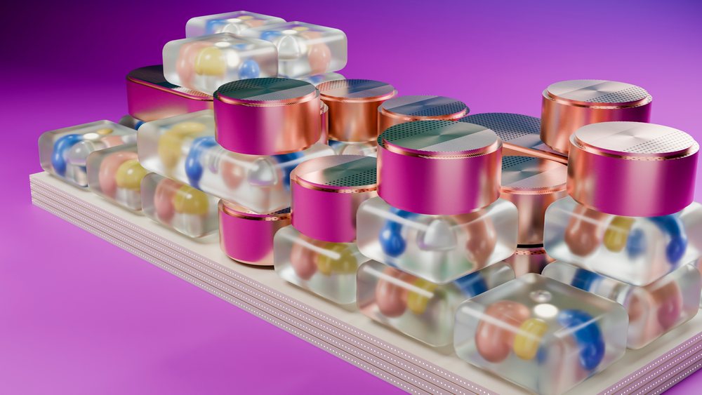 Multicolor capsules arranged in a transparent blister pack with metallic pink lids on a white holder against a purple background.