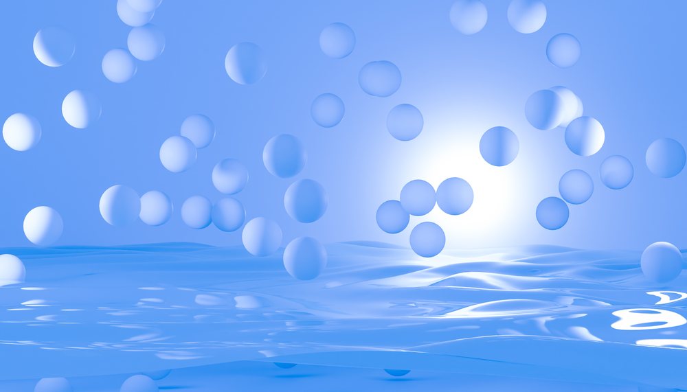Blue spheres float above a rippled abstract blue surface, abstract render background.