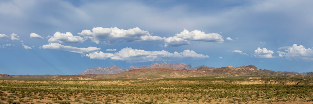 Clouds drifting over the rocky Chisos Mountains within the arid desert landscape of, Big Bend National Park, Texas, USA.