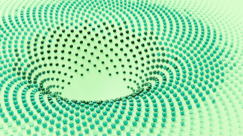 Digital 3D illustration of turquoise spheres arranged in symmetrical concentric spiral circles on a green gradient background with depth effect.
