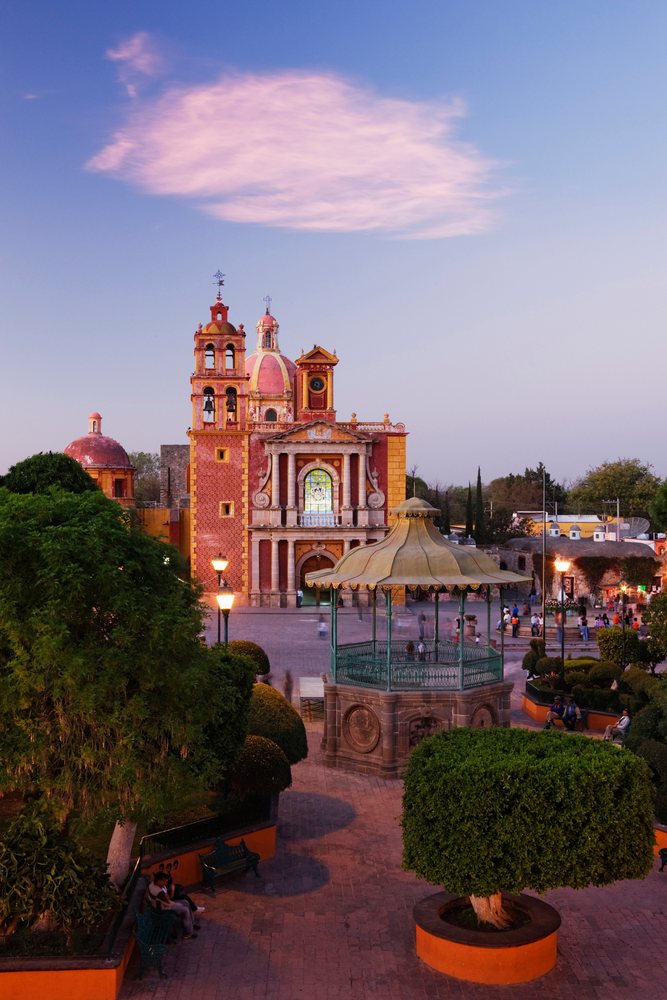 Santa Maria de la Asuncion church and gazebo during evening, Queretaro, Mexico.