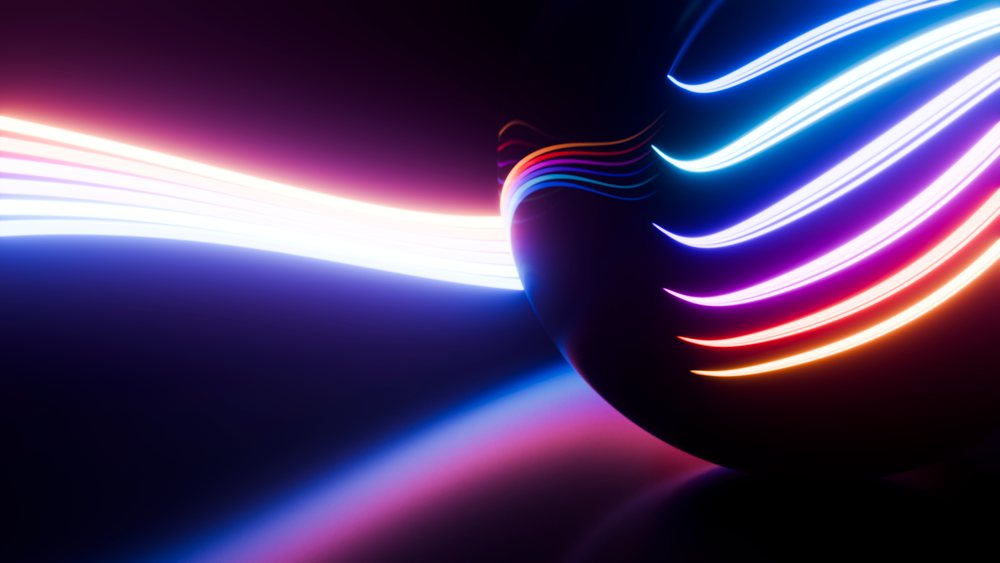 Glowing sphere surrounded by colorful neon light trails on a dark background in a digital abstract illustration.