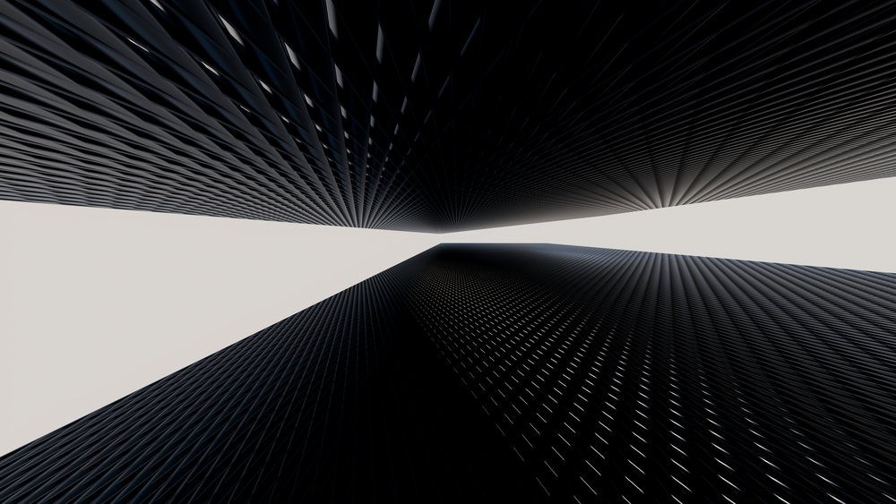 Abstract modern architecture featuring dark metal panels arranged in a symmetrical geometric pattern forming a cut-out space between two vertical walls.