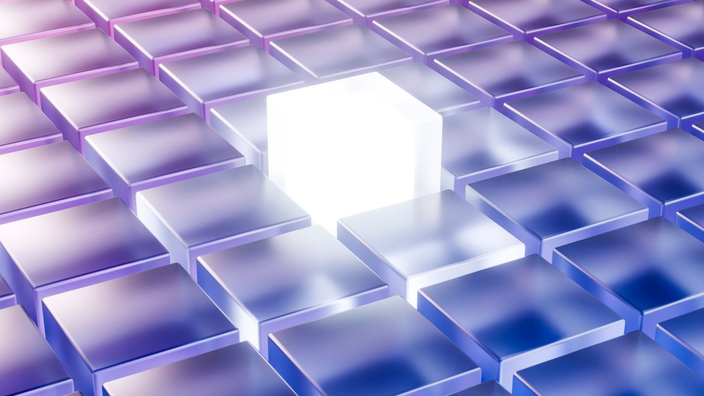 Glowing white cube is centered among translucent blue and purple cubes arranged in a 3D geometric grid pattern.
