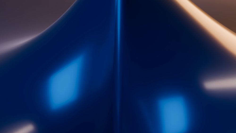 Abstract blue smooth glossy curved surface with reflective highlights and flowing shapes.