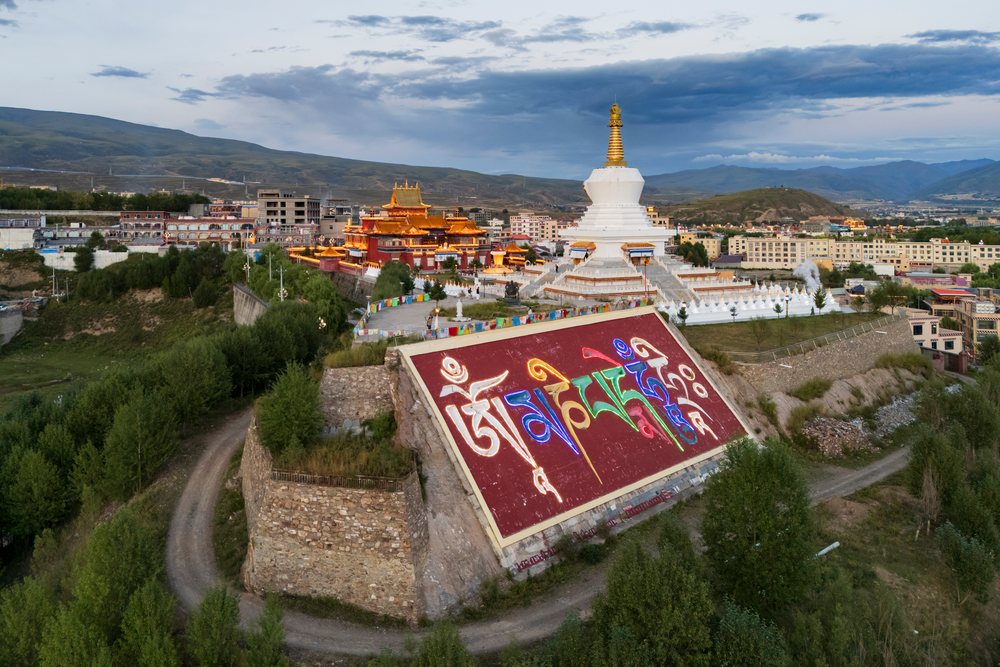 Zhu de commander in chief and WushiGeda Living Buddha Memorial at Sunset, Garze, Sichuan Province, People's Republic of China.