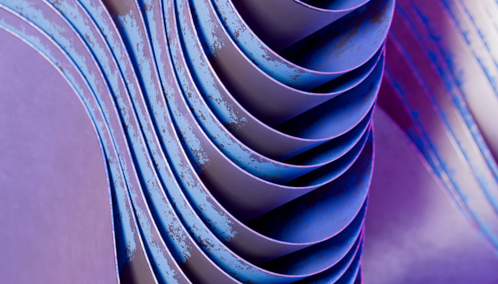 Curved sheets of rusty blue and purple metal with a textured surface creating an abstract industrial pattern.