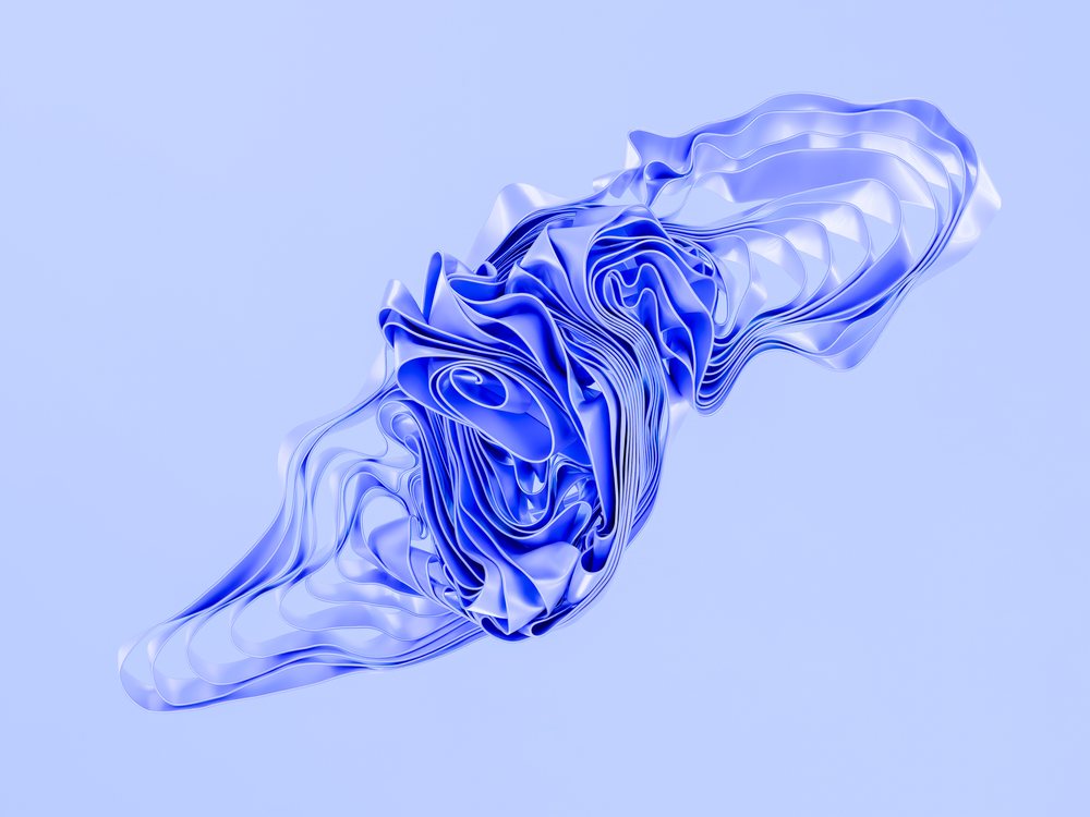 Close-up of a blue abstract folded shape with smooth flowing lines and translucent layers.