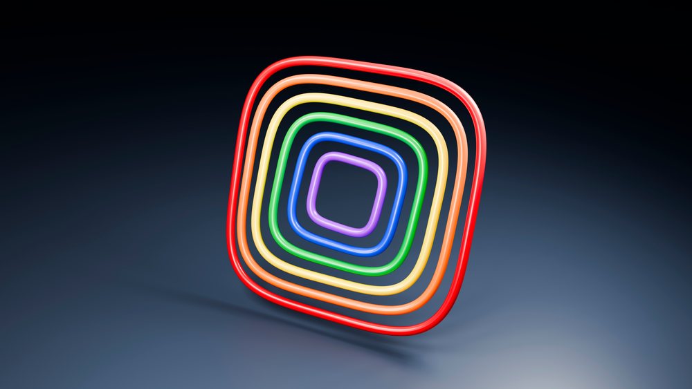Colorful glowing neon square loops concentrically arranged in decreasing size on a dark gradient background.