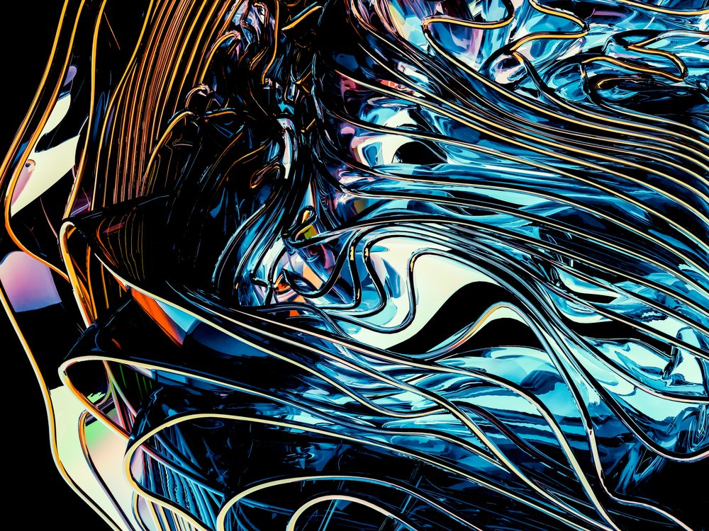 Close-up of an abstract sculpture with shiny, twisting metal ribbons reflecting blue and silver tones.