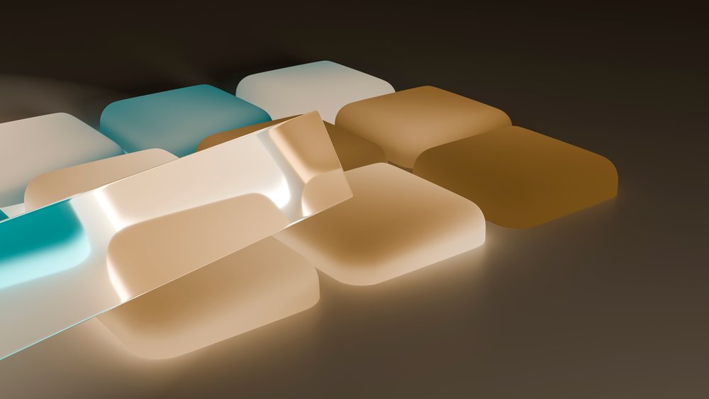 Digital illustration of glossy rounded colorful tiles with reflections arranged in a grid pattern.
