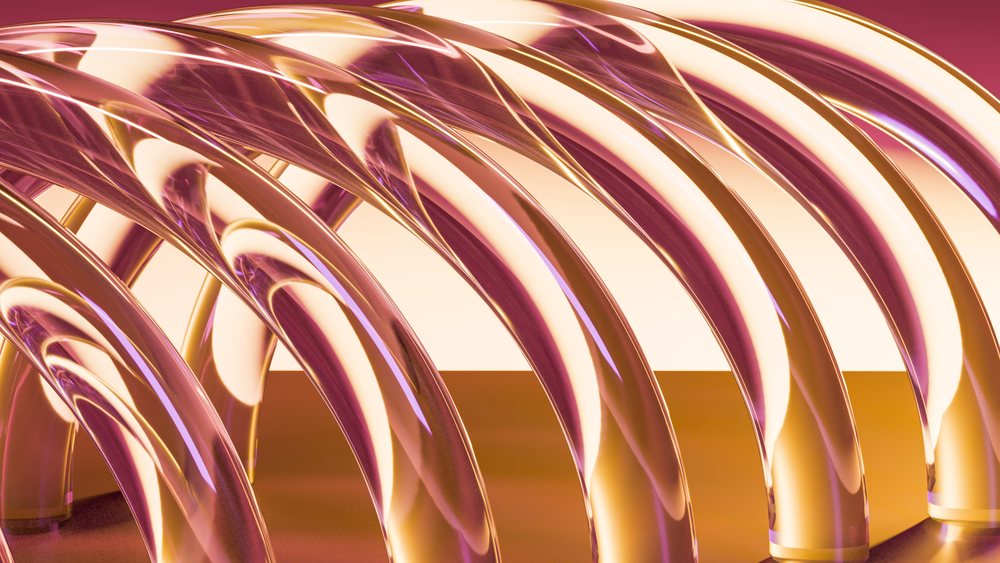 Abstract glass sculpture with curved translucent forms on an orange surface against a pink backdrop.