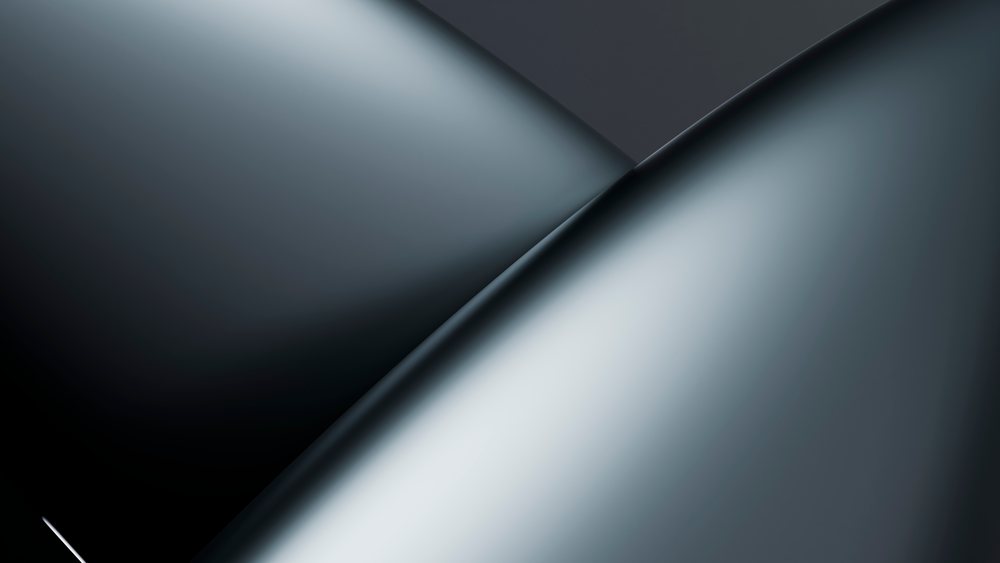 Abstract black smooth shiny curves with overlapping shapes and gradient reflections in a modern digital design.