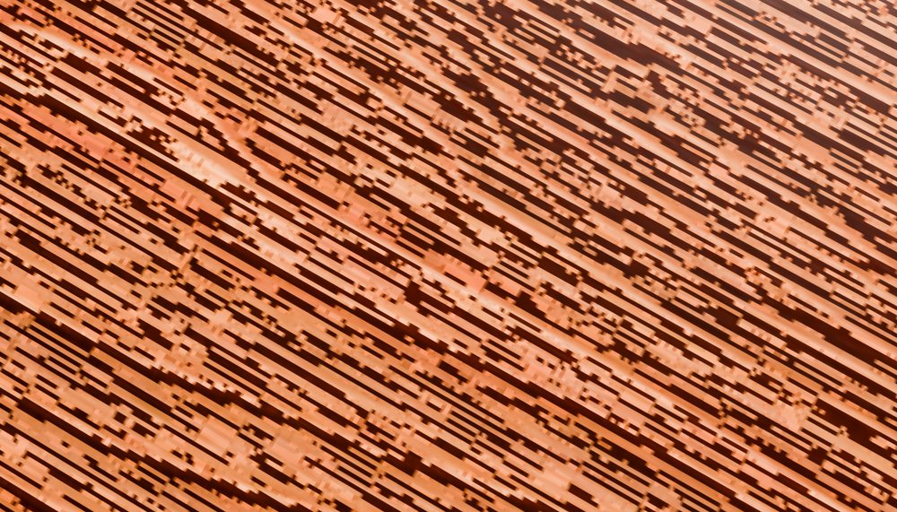 Wire coils tightly wound and arranged in a repeating pattern showing the shiny metallic texture and spiral structure.