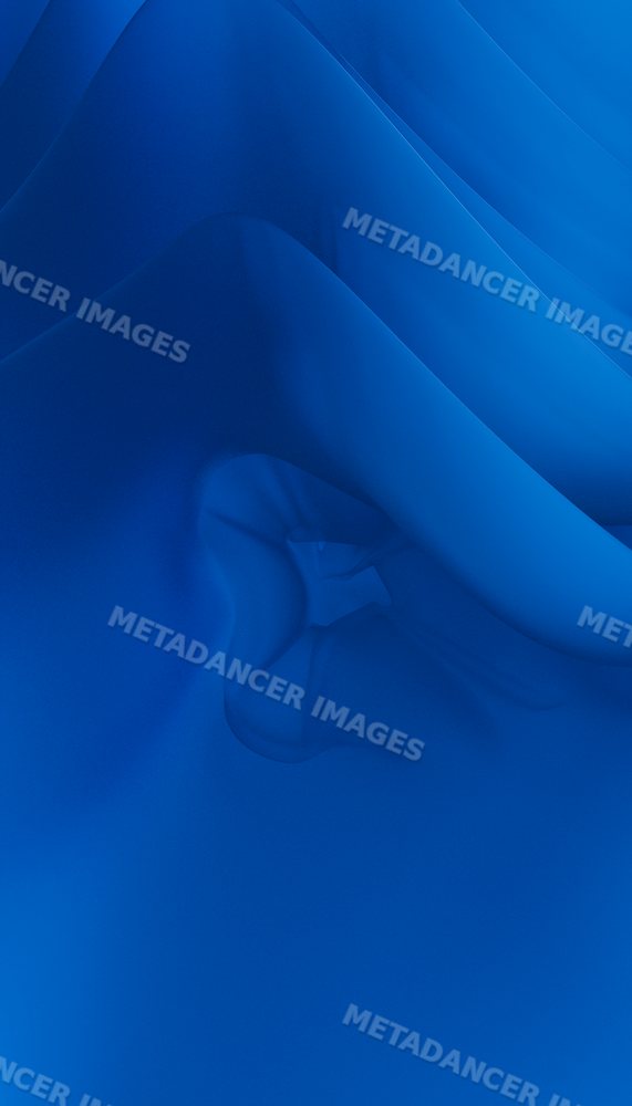 Close-up shot of blue fabric with abstract folds and wrinkles