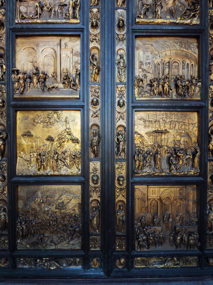 Replica of the Ghiberti Doors with ornate bronze relief panels displayed at Grace Cathedral, landscape, cityscape, city life, San Francisco, California, USA.