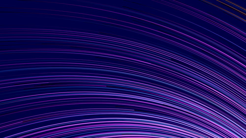 Curved purple and blue light streaks form a vibrant abstract pattern on a dark background with motion blur effects.
