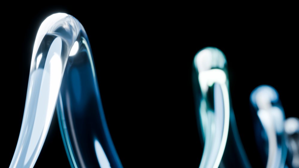 Abstract digital illustration of curved translucent glass shapes with blue tones on a black background.
