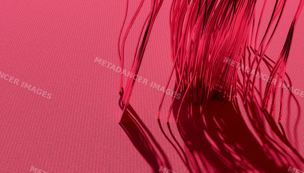 Close-up of red threads casting detailed shadows on a textile surface