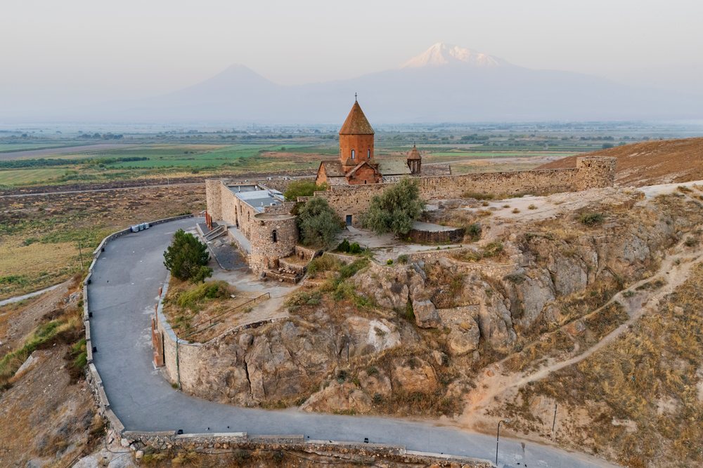 Khor Virap Monastery is located on a rocky hill with Mount Ararat towering behind it, Lusarat, Ararat Province, Armenia.