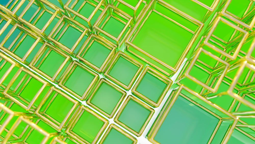 Cluster of green transparent glass cubes with golden edges arranged in a geometric pattern.