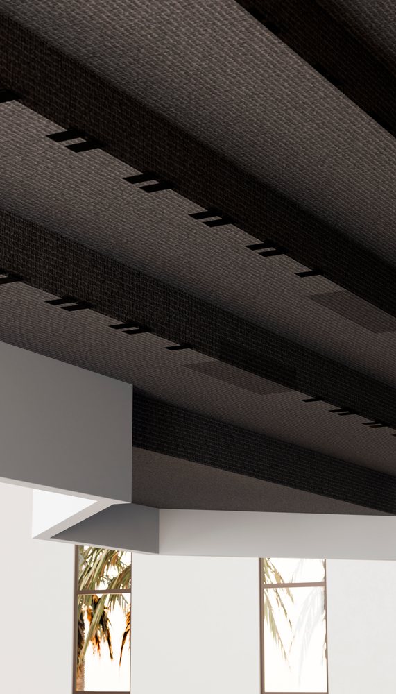 Modern interior ceiling featuring dark structural beams and white walls illuminated by natural light through rectangular windows.