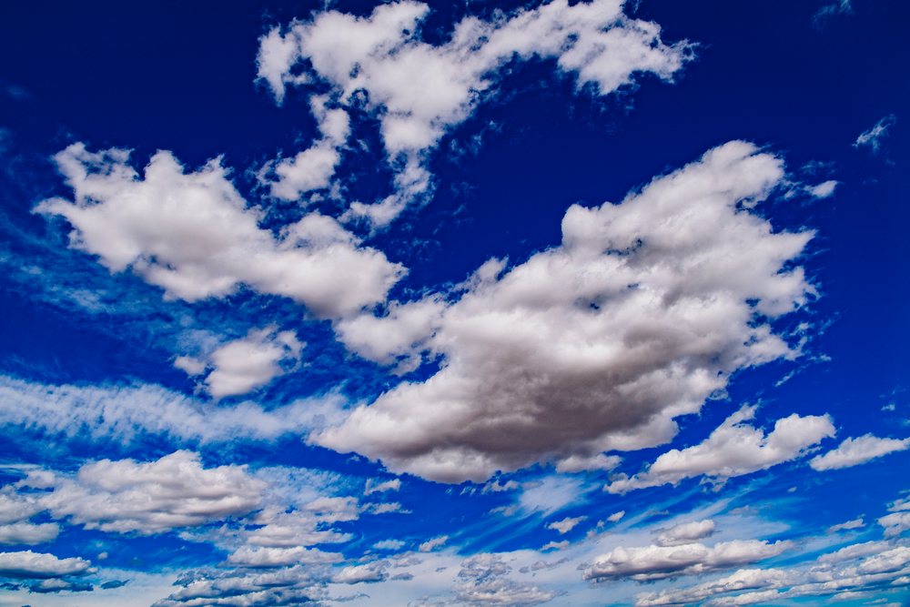 Blue sky with various white, fluffy clouds outdoors under natural daylight, Nevada, USA.