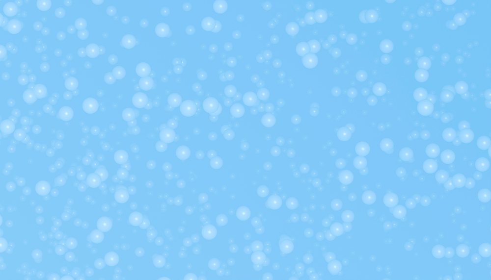 Translucent bubbles floating on a blue background with soft light reflections and varied sizes.