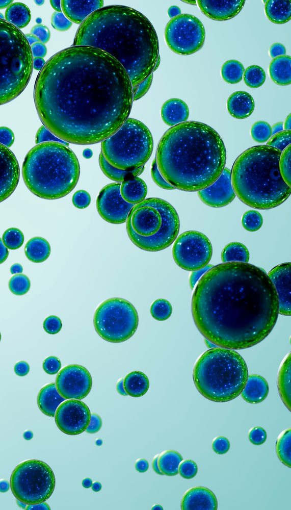 Blue and green glowing spheres floating against a light blue background in a digital abstract composition.