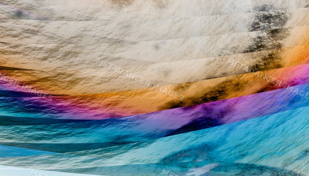 Vibrant abstract waves creating colorful reflections on textured water