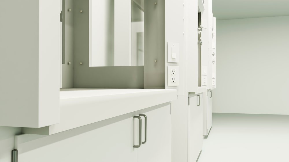 Empty white locker room hallway with mirrors and cabinets, reflecting electrical outlets and wall switches in a clean, organized setting.