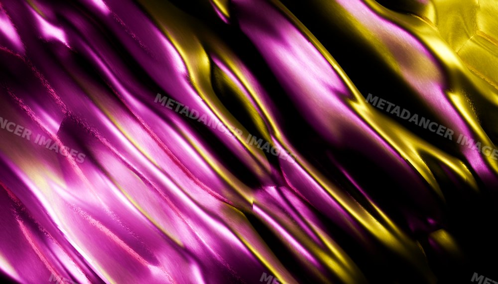 Close-up of shiny abstract purple and gold metallic textured surface