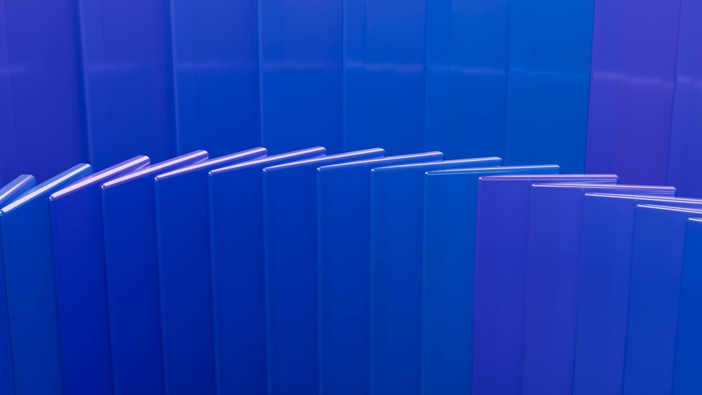 Curved blue shiny panels arranged in rows form an abstract smooth geometric pattern illustration.