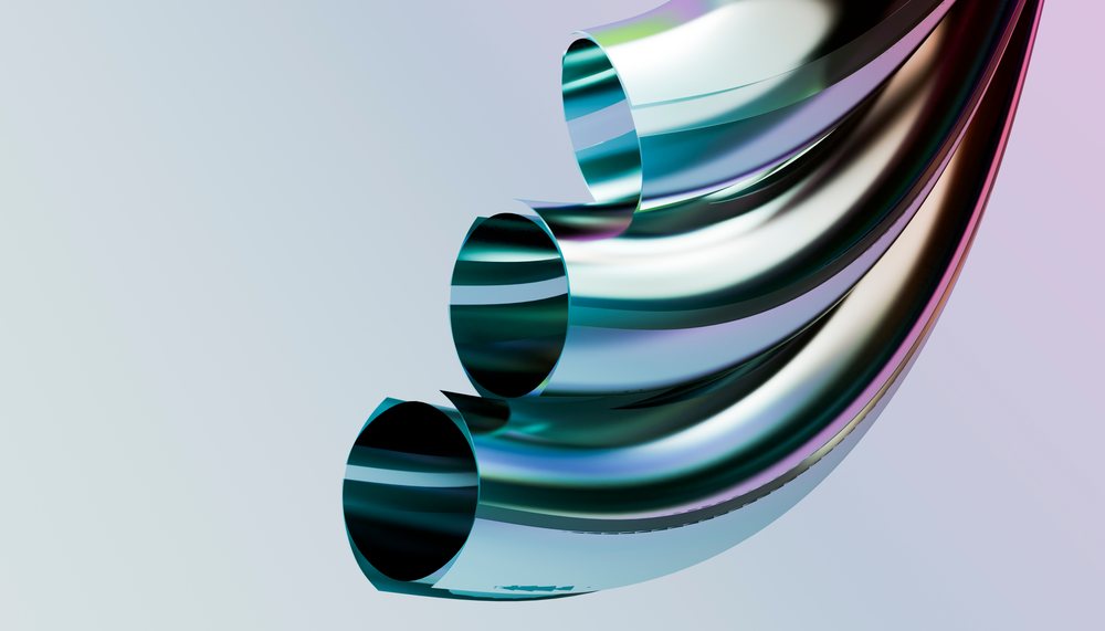 Shiny curved stainless steel tubes with reflective surfaces on a light background.