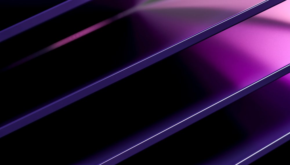 Three metallic parallel diagonal lines illuminated by purple light form an abstract geometric pattern on a black background.